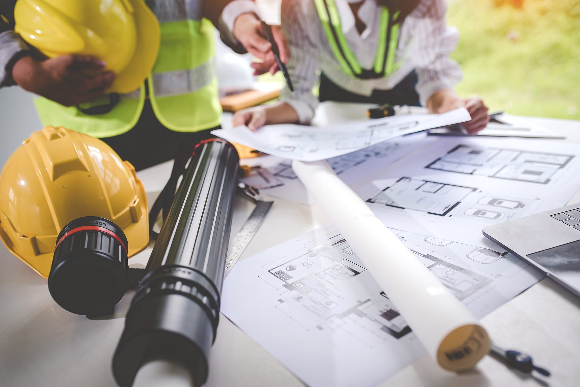 architect concept, working architect with blueprints in office to present to customers