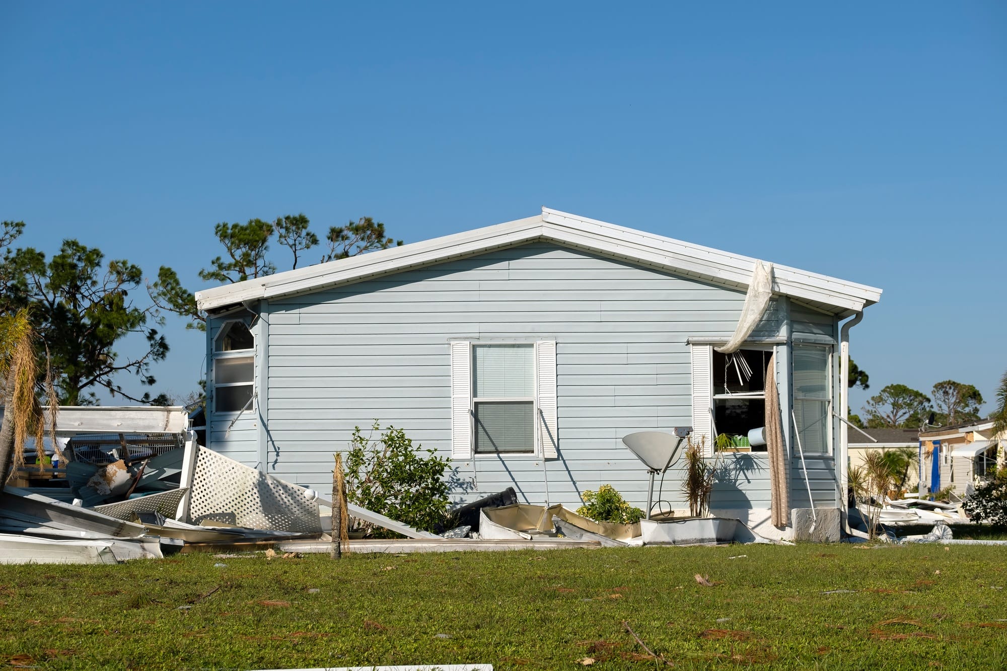 Collapsed and damaged mobile homes after hurricane swept through Florida